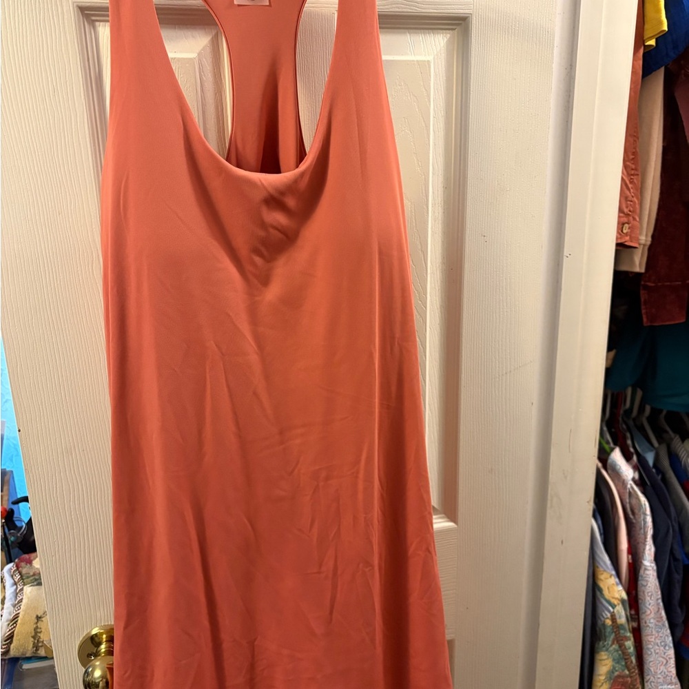 Calla Coral Sleeveless activewear dress.